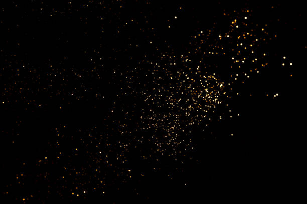 istock Golden abstract bokeh on black background. 1271934335