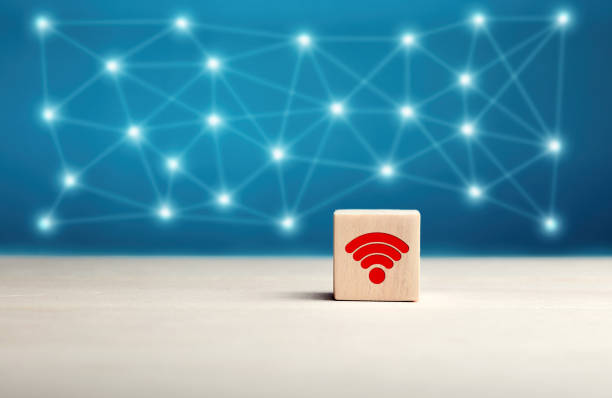 istock Wifi symbol on wooden cube with wireless connection network background. Wi-fi connection range and wireless network concept. 1271935056