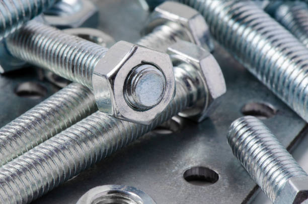 istock Metal bolts and nuts. Tools for working and fixing. Macrophotography. 1271935850