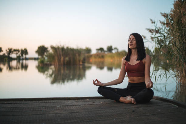 istock Yoga on lake 1271937123