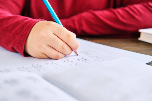 istock Education at home. Cute child learning mathematics at home. Homeschooling 1271939455