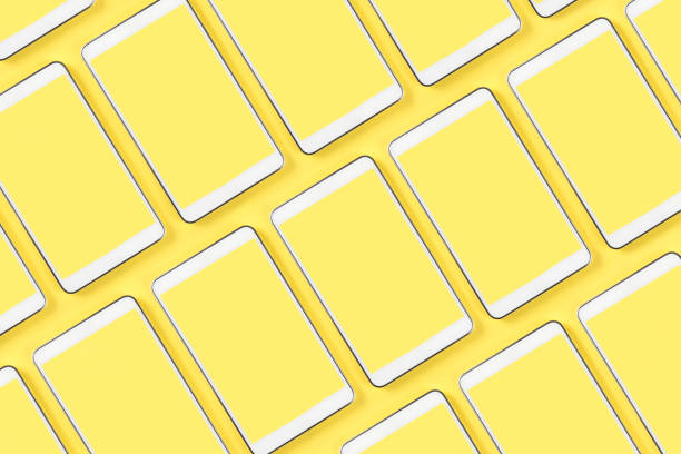 istock Smartphones on Yellow Background 1271940062
