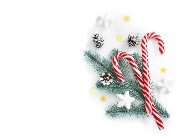 istock Christmas composition with candies isolated on white background. Top view. 1271941073
