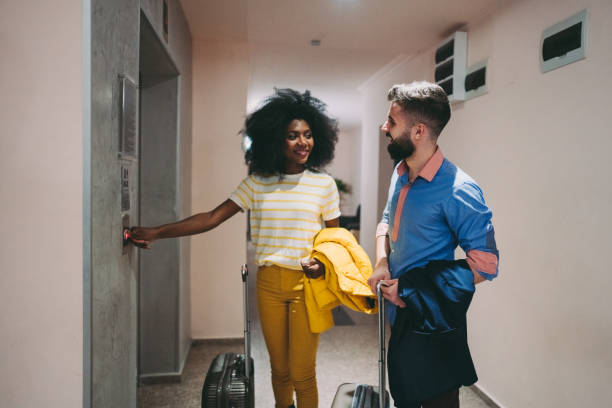 istock Couple just arriving in hotel 1271941109