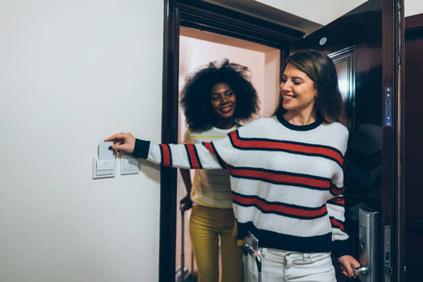 istock Friends just arriving in luxury hotel 1271942439