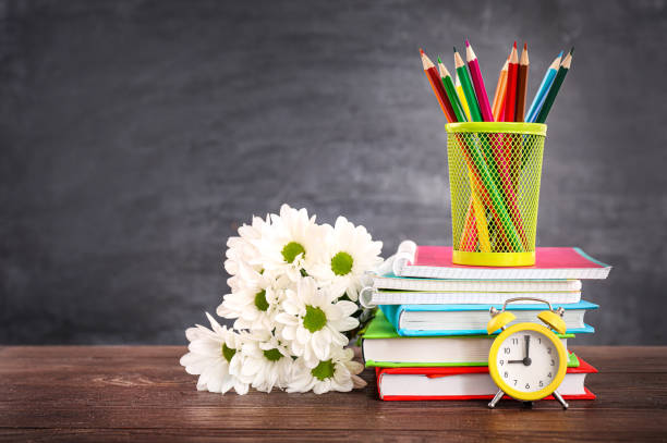 istock Teacher's day greeting card on black chalkboard background. Copy space. 1271943681