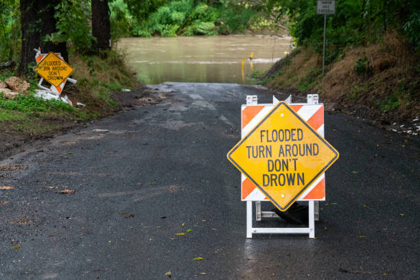 istock Road Closed to Flooding 1271944845