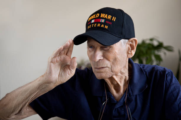 istock World War Two Veteran saluting looking away 1271946668