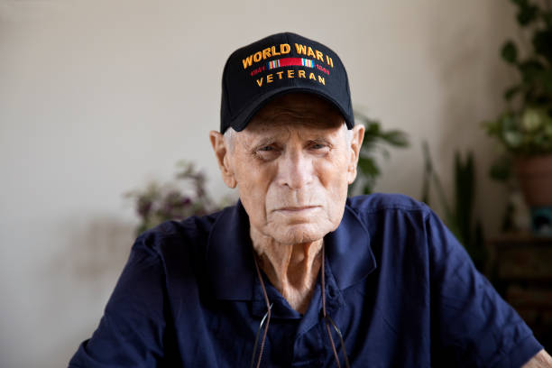 istock World War Two Veteran sitting at home looking at camera 1271946670