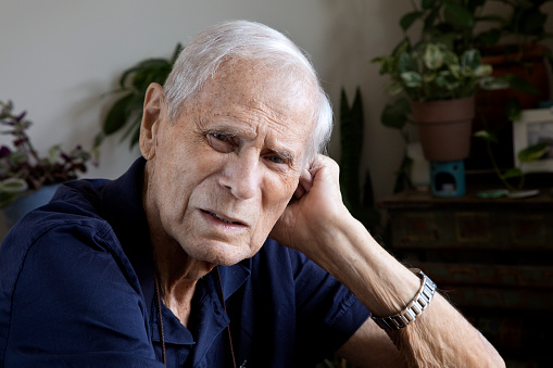 Elderly man thinking about what’s next while approaching the end of life. \n\n,