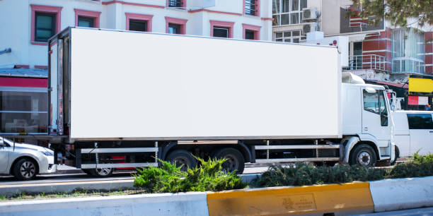 istock long cargo truck with empty white banner on bodywork commercial posting concept 1271946914