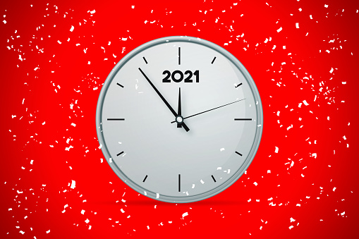 Clock and a 2021 concept. Horizontal composition with copy space.