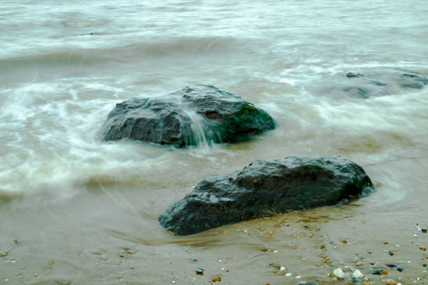 istock Long exposure of the incoming tide 1271956810