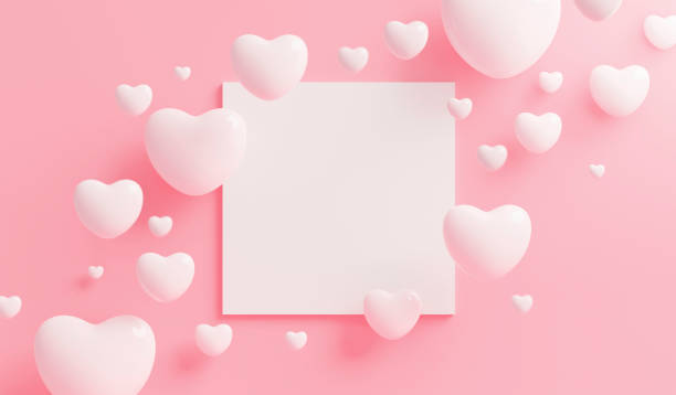 istock White heart with blank frame on pink background with copy space 3d render 1271957241