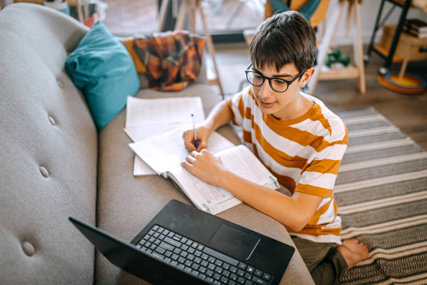 istock Distance learning from home on video conference call 1271957477