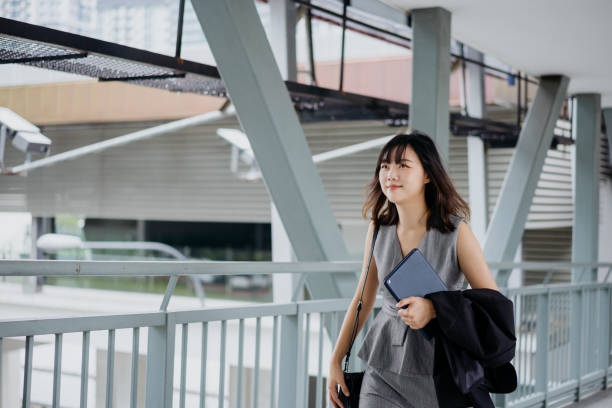 istock Confidence Asian Chinese businesswoman going to work 1271958456