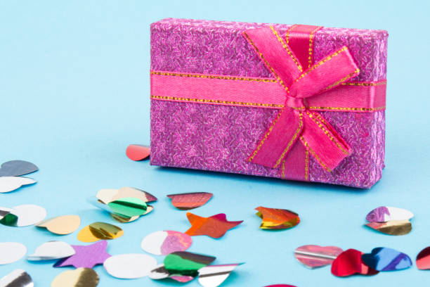 istock beautiful gift box with a bow on a blue background. Copy spase 1271961167
