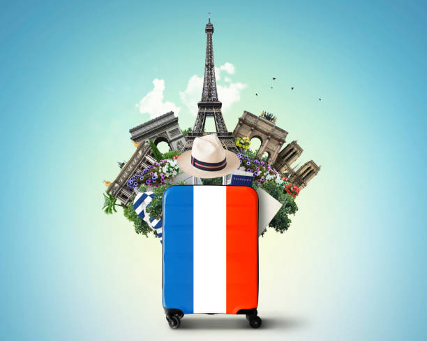 istock France, modern suitcase with French flag 1271961502