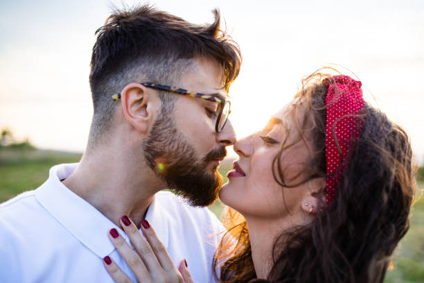 istock A young couple about to kiss 1271963791