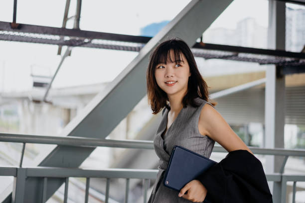 istock Confidence Asian Chinese businesswoman going to work 1271963907