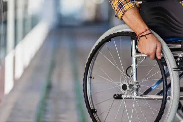 Photo of Man in wheelchair