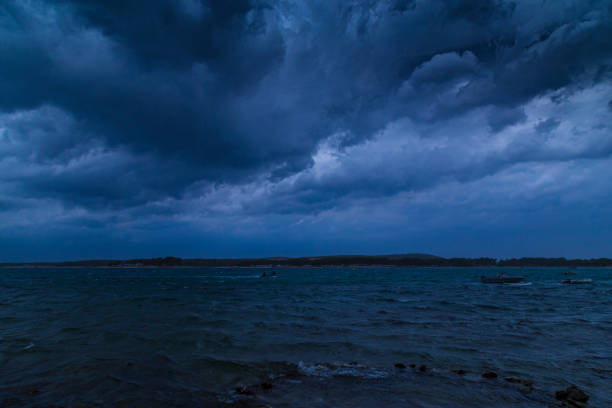 istock Dramatic storm clouds and rain over the Adriatic Sea 1271965376