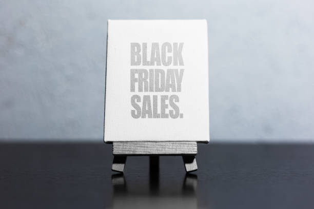 istock Close-up of black friday sales text, on the small easel. 1271973292