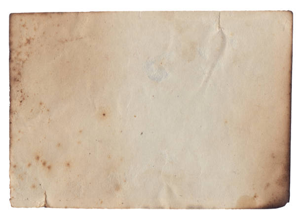 istock Old vintage texture retro paper with burned edges, stains and scratches background 1271977913