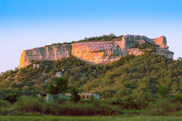 istock Mountain landscape in the light of the setting sun 1271978514