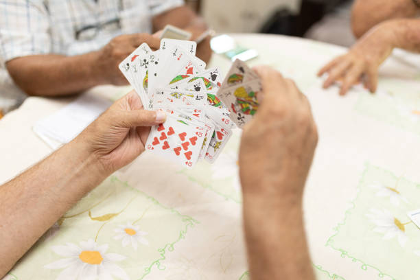 istock Close up man hand with playing card 1271991672
