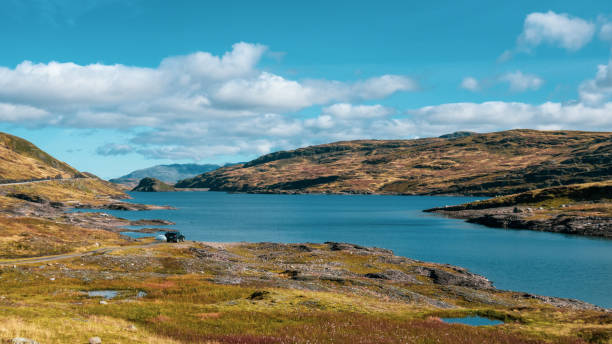 istock Norway high mountain lake on sunny day landscape 1271992363