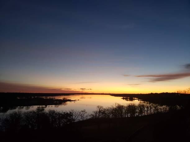 istock The sky reflects over the lake 1271992578