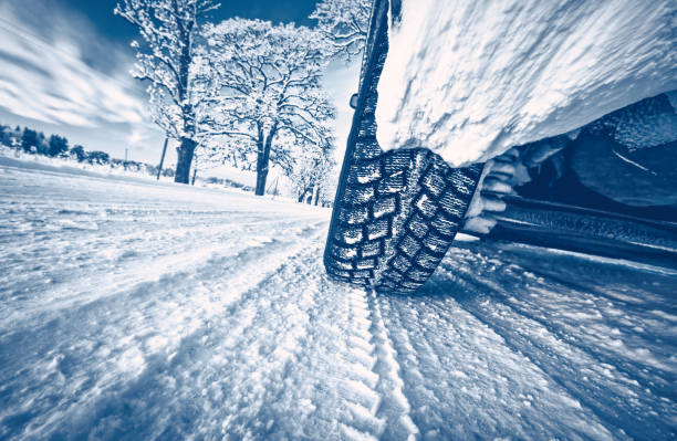 istock Car on the road in winter evening. 1271996184