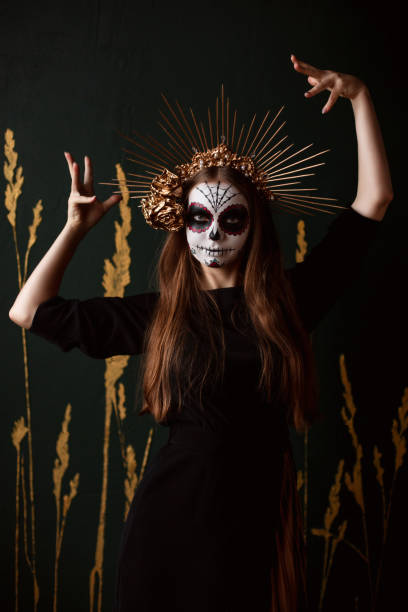 istock Dia De Los Muertos. Halloween Sugar skull creative make up. 1271999652