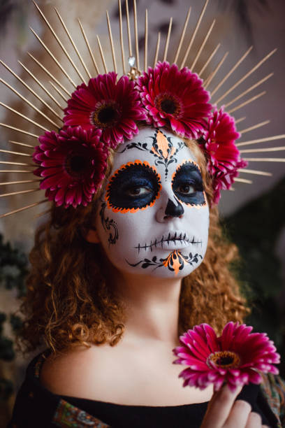 istock Dia De Los Muertos. Halloween Sugar skull creative make up. 1271999802