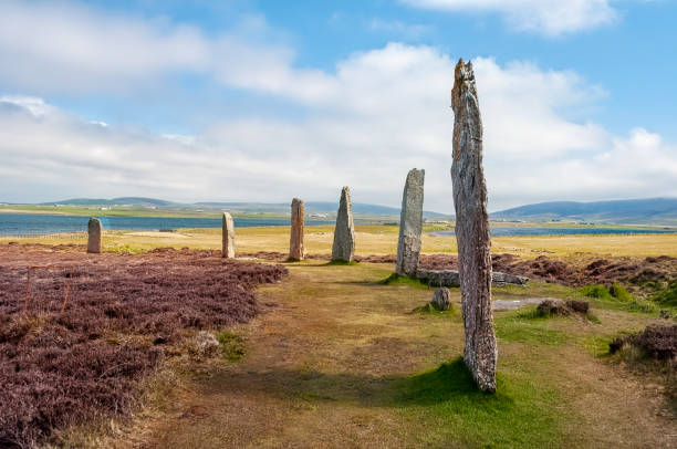 Standing Stones of Stenness dates from at least 3100BC and are part of the Heart of Neolithic Orkney UNESCO World Heritage Site, Scotland, UK Standing Stones of Stenness dates from at least 3100BC and are part of the Heart of Neolithic Orkney UNESCO World Heritage Site, Scotland, UK orkney islands stock pictures, royalty-free photos & images