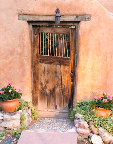 istock Santa Fe (NM) Style: Traditional Rustic Wood Door, Adobe Wall 1272006789