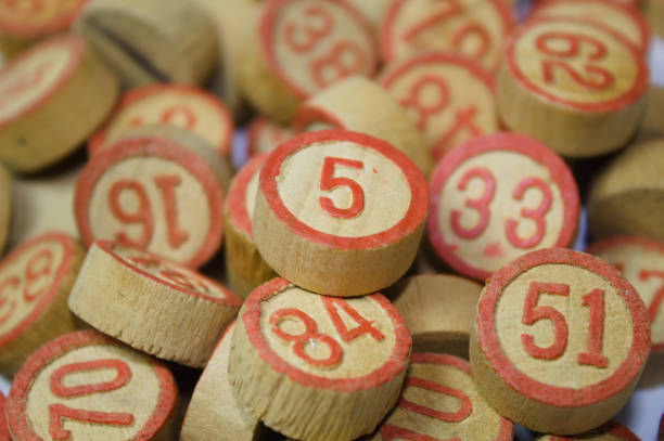 istock Wooden bingo game pieces with numbers 1272007576