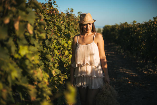 istock Woman in vineyard 1272007584