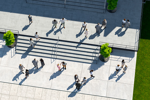 Business people in front of office building. This is entirely 3D generated image.