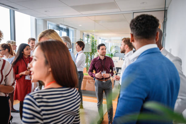 istock Multi-Ethnic Group of Business Colleagues at Office Party 1272017366