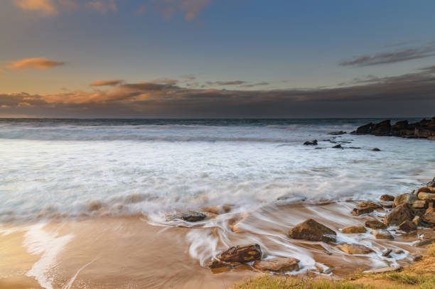 istock Winter Sunrise High Tide and Big Surf 1272017587