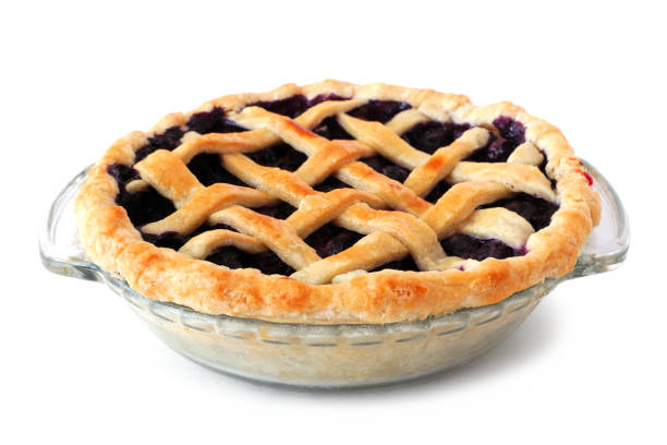 istock Homemade blueberry pie with lattice pastry isolated on white background 1272019063