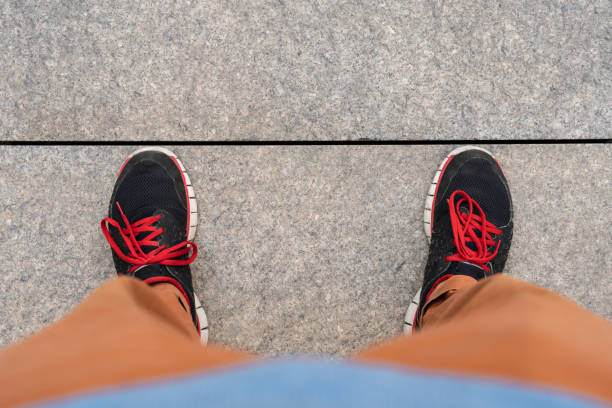 istock Men Standing on the Floor 1272022598