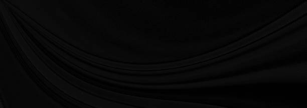 istock Black gray satin dark fabric texture luxurious shiny that is abstract silk cloth panorama background with patterns soft waves blur beautiful. 1272026163