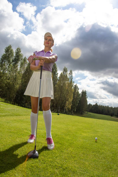 istock Golfer hitting with a club 1272029540