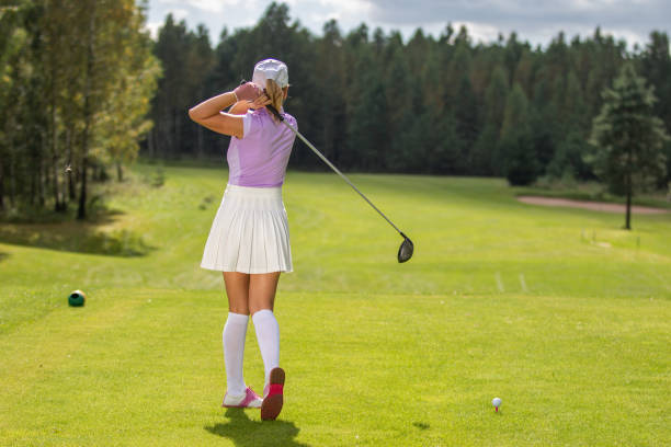 istock Golfer hitting with a club 1272031020