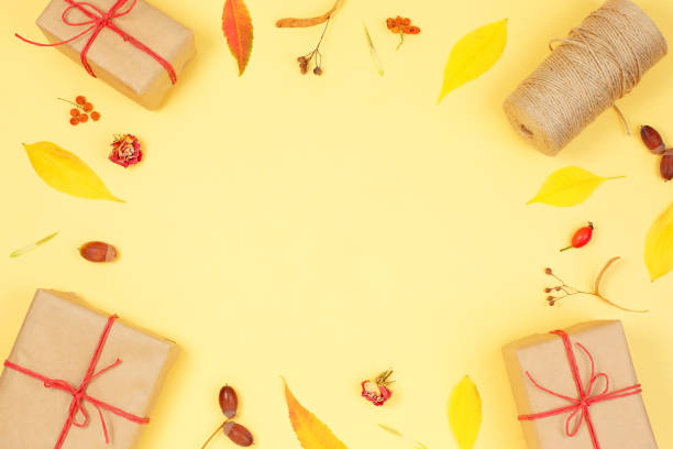 istock Autumn frame with gift boxes and autumn leaves, 1272032049