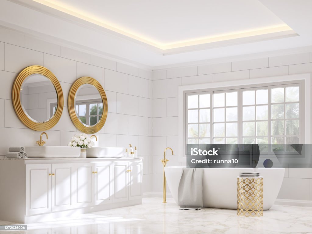 Classical style bathroom with white and gold 3d render Classical style bathroom 3d render,There are white marble floor and white wall tile with brick pattern,Decorate with golden object ,Rooms have large windows, overlook terrace and nature view. Bathroom Stock Photo