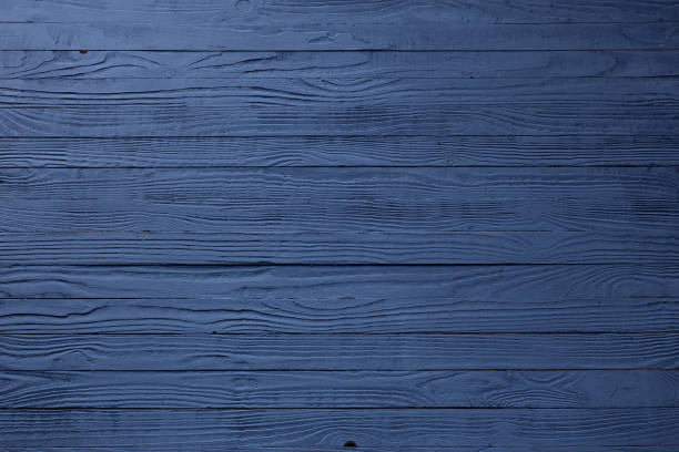 istock blue dark painted wooden background 1272045747